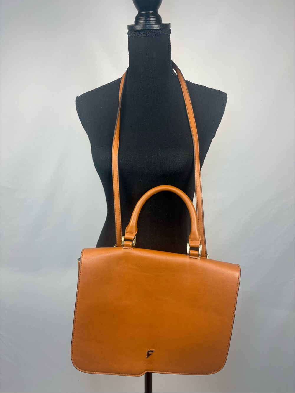 Classic Tan Leather Satchel with Top Handle and Strap